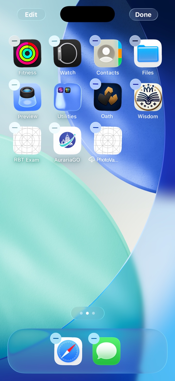 An iPhone Home Screen where all of the app icons are wiggling, each with a small minus sign in its upper-left corner.